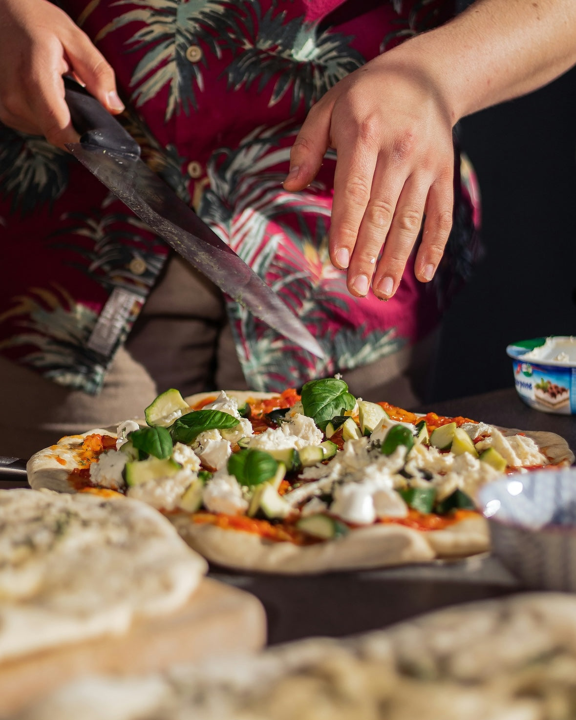 Home baker making pizza at home