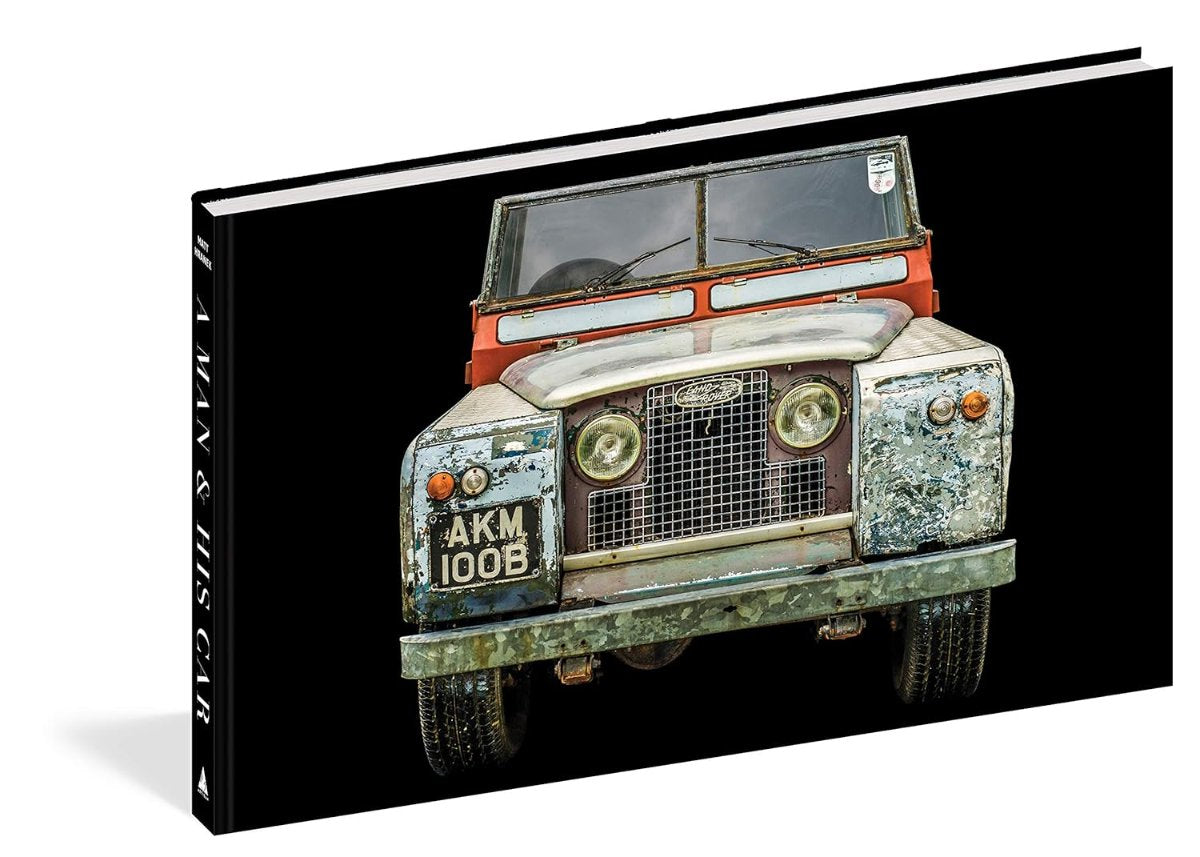 Man and car book side