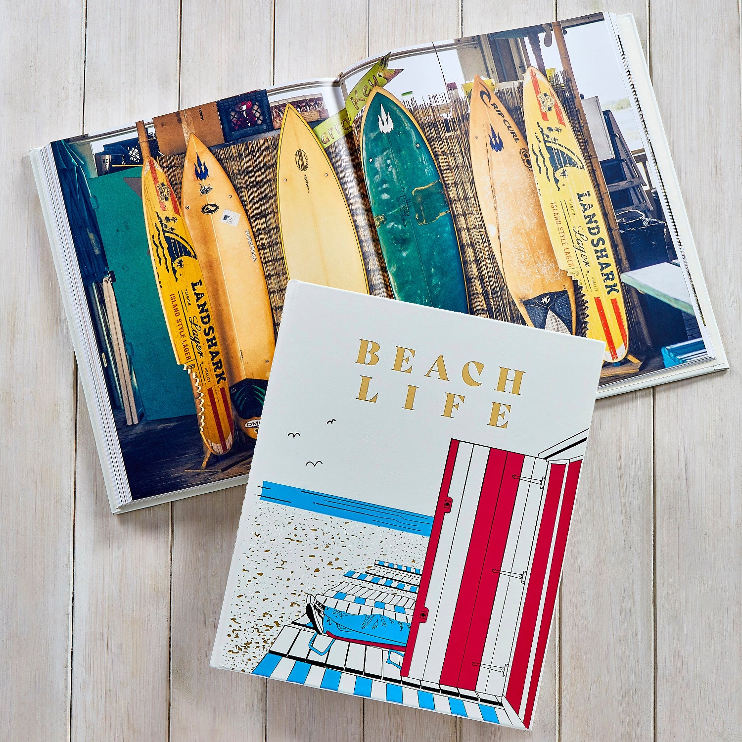 Beach Life book on wooden plank floor