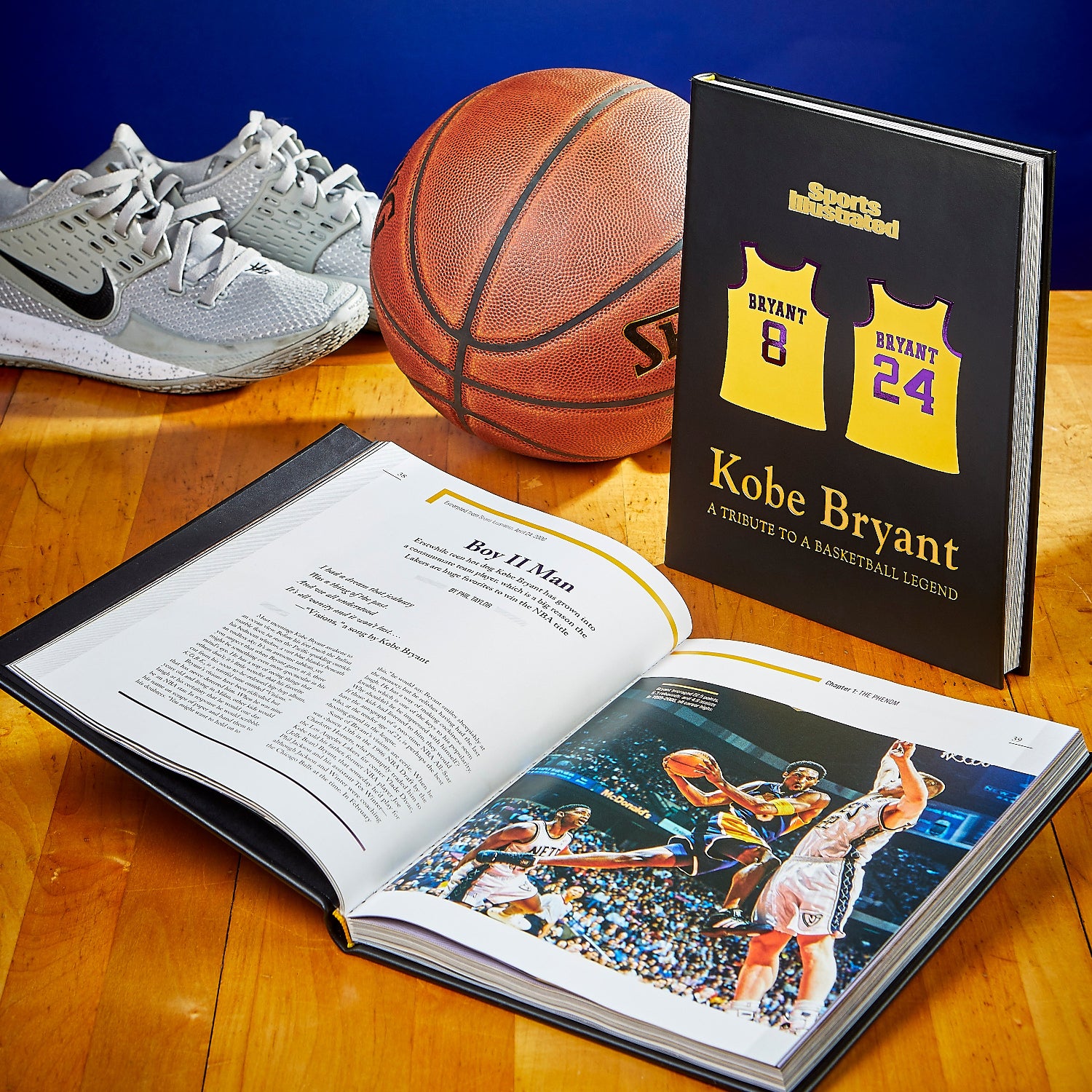 Kobe Bryant: A Tribute to a Basketball Legend book on court with shoes and basketball