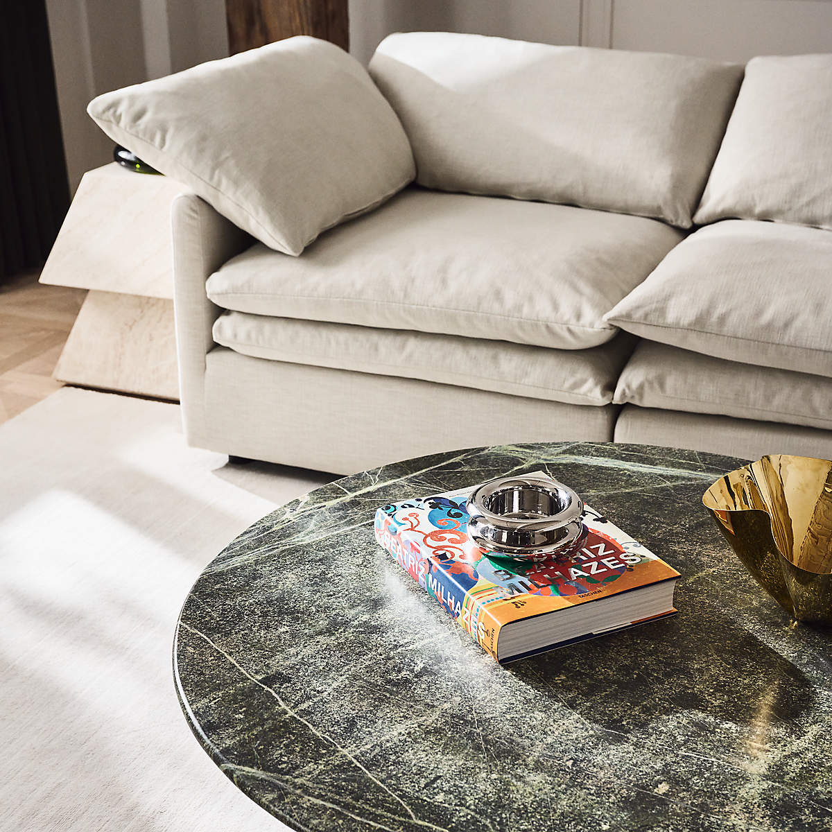 Colorful coffee table book on green marble table