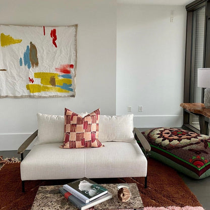 Colorful textured living room with books